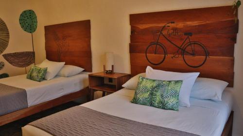 Cama o camas de una habitación en Hotel Sur Bacalar