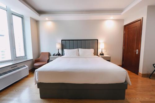 Cama o camas de una habitación en Asiatic Hotel - Flushing
