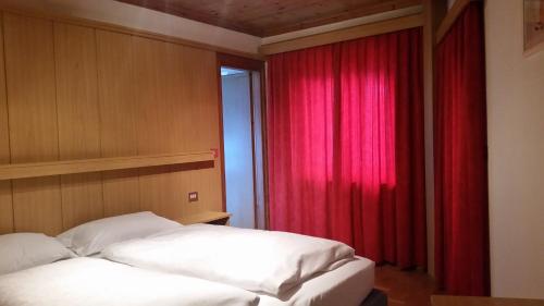 Postel nebo postele na pokoji v ubytování Chalet Helen