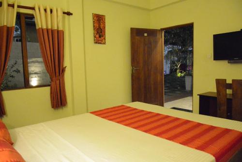 Postel nebo postele na pokoji v ubytování Hotel Thilon