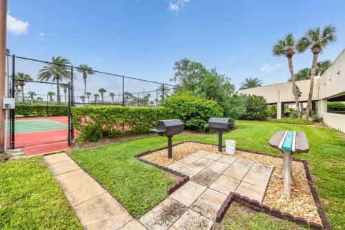 a backyard with a tennis court and a tennis court at New Listing Most Amazing Beach Views Pool in Saint Augustine