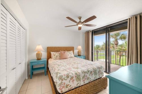 a bedroom with a bed and a balcony at New Listing Most Amazing Beach Views Pool in Saint Augustine