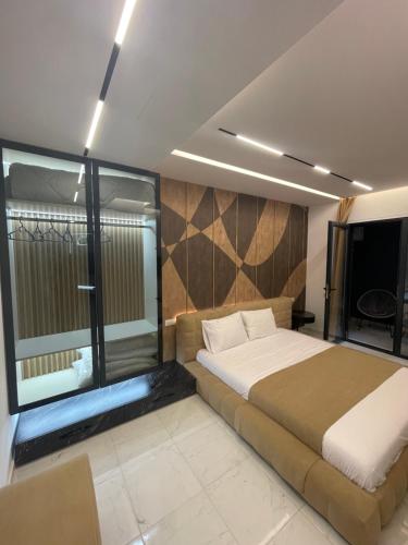 Llit o llits en una habitació de Cahani Suite