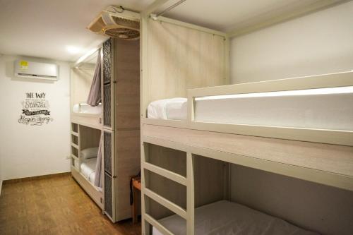Katil atau katil-katil dalam bilik di Casa Avelina Boutique Hostel