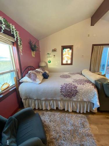 a bedroom with two beds and a window at Studio-Alaska's Point of View-Private-intown in Seward