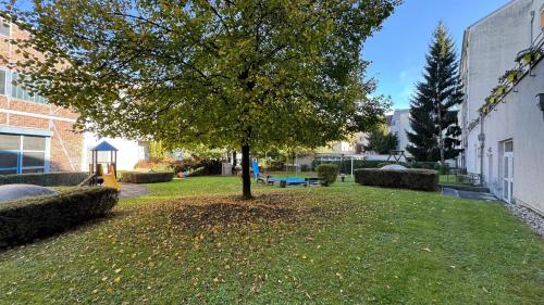 Jardín al aire libre en City Apartement Linz für 5 Gäste mit self-checkin und Küche