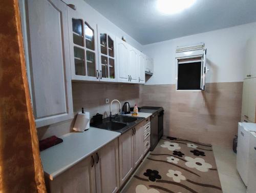 Kuchyň nebo kuchyňský kout v ubytování Bgd apartman