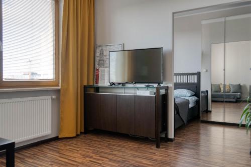 En eller flere senge i et værelse på Airport Residence Amber