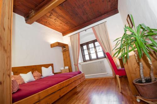 Posteľ alebo postele v izbe v ubytovaní Hotel Fahrnberger