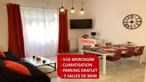 TV/trung tâm giải trí tại Appartement Stella 95 m2 climatisé parking proche Sanctuaires