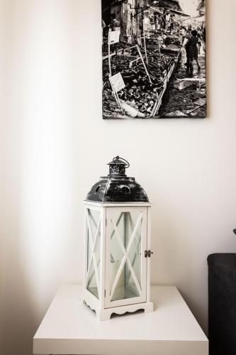 a lantern sitting on a table in a room at Palermo ai Leoni in Palermo