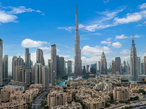 Skyline Serenity Holiday Home I Bespoke 1 Bedroom Apartment I Burj Khalifa & Fountain Views I Free Gym, Pool, Wi-Fi, Parking & PS5