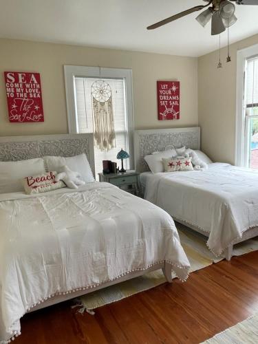 Ένα ή περισσότερα κρεβάτια σε δωμάτιο στο Le Madame Bleu