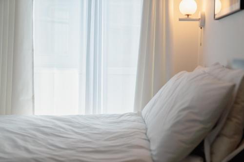 The Phase Boutique Hotel 동대문にあるベッド