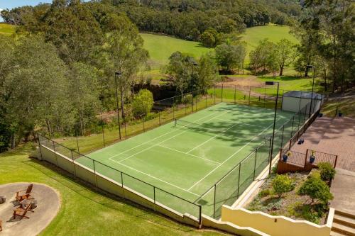 an overhead view of a tennis court at Bella Casa by Latitude South Coast in Berry