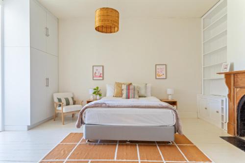 Postel nebo postele na pokoji v ubytování Hollybrooke Cottage, East Launceston