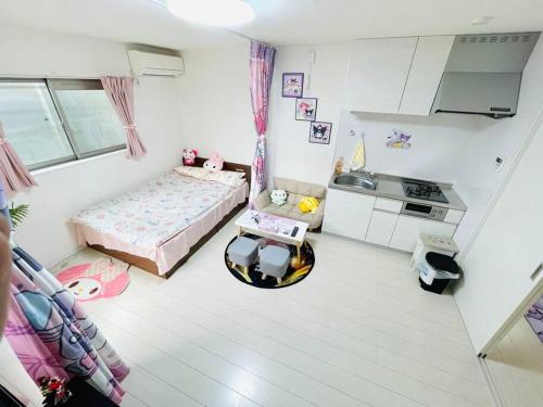 Kitchen o kitchenette sa 糖果屋 岸里玉出
