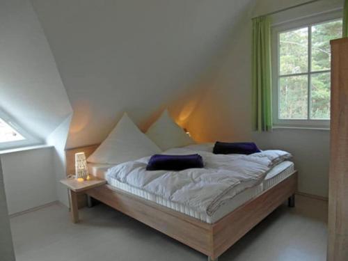 Voodi või voodid majutusasutuse Dune 8 Comfortable holiday residence toas