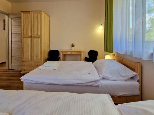 Postel nebo postele na pokoji v ubytování Holiday Home Wi niowa with Pool and Mountains