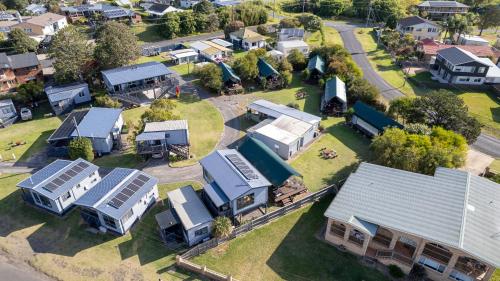 an aerial view of a small village with houses at South Coast Retreat in Greenwell Point