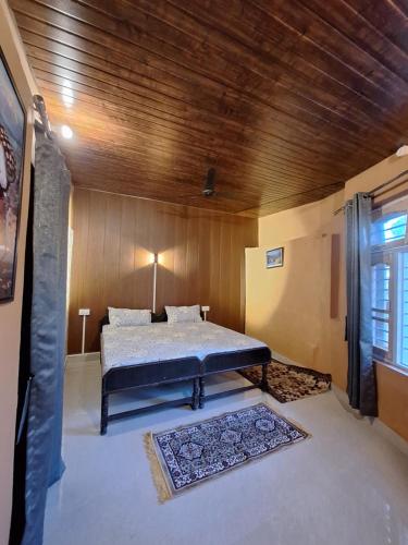 Postel nebo postele na pokoji v ubytování TATHASTU Bir -Homestay ,DORM,HOSTEL