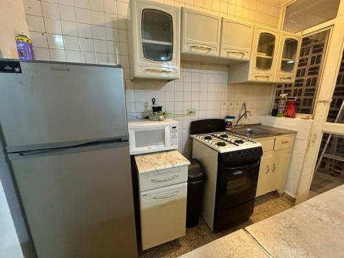 Una cocina o cocineta en Apartamentito Supercéntrico