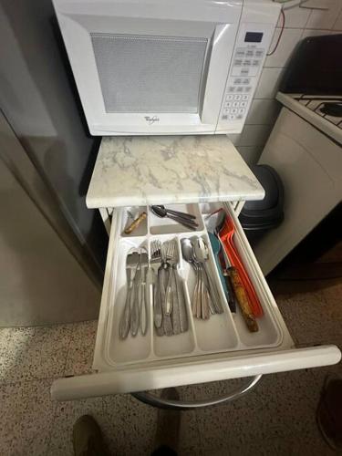 Una cocina o cocineta en Apartamentito Supercéntrico