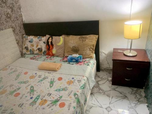Llit o llits en una habitació de Stable Apartment