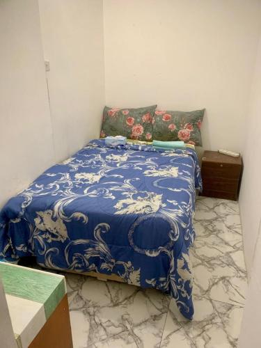 Llit o llits en una habitació de Stable Apartment