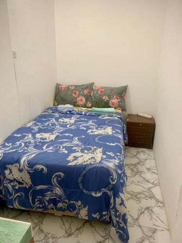 Llit o llits en una habitació de Stable Apartment