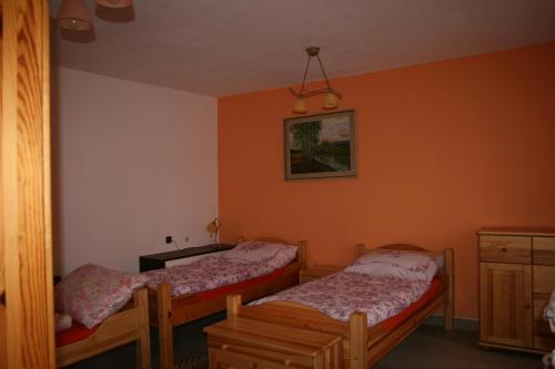 Cama o camas de una habitación en Podřipská Farma