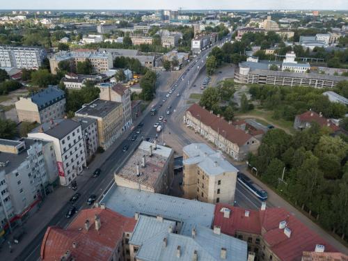 an aerial view of a city with a street at ApartHotel Riga in Rīga