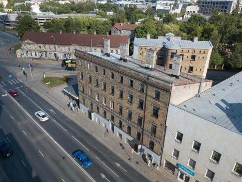 an aerial view of a building and a street at ApartHotel Riga in Rīga