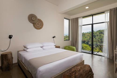 Ένα ή περισσότερα κρεβάτια σε δωμάτιο στο The Terrace 129