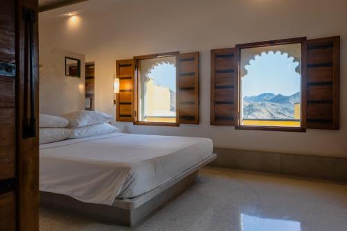Cama o camas de una habitación en RAAS Devigarh
