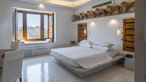 Cama o camas de una habitación en RAAS Devigarh