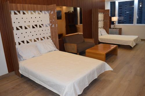 Ένα ή περισσότερα κρεβάτια σε δωμάτιο στο Polanco CARSO SOUMAYA