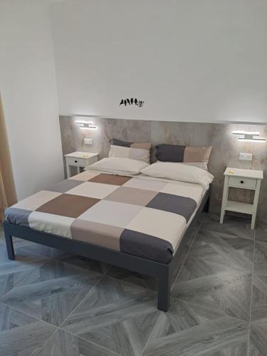 Postel nebo postele na pokoji v ubytování B&B Clarosa