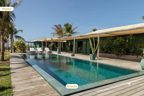 Πισίνα στο ή κοντά στο Casa FRENTE MAR com piscina incrível