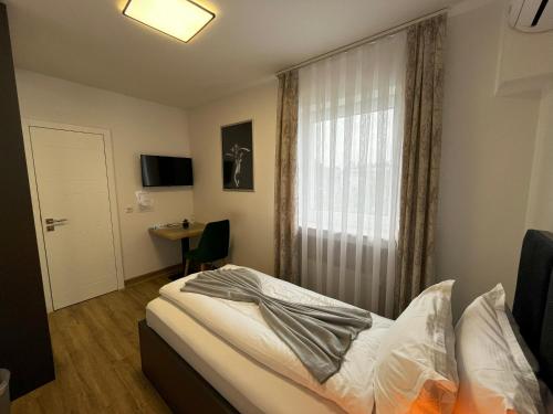 Letto o letti in una camera di Haven Hotels - Hotel Dona