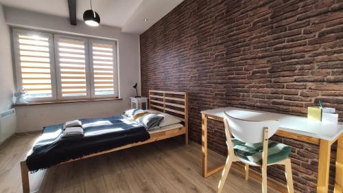 Al Słowackiego 16 by Homeprime