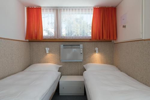 Postel nebo postele na pokoji v ubytování Chalet Pfiff