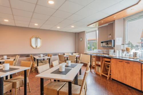 Kuchyň nebo kuchyňský kout v ubytování Euro-Hotel