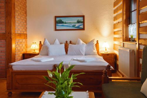 Posteľ alebo postele v izbe v ubytovaní Hotel Na Vyhlídce
