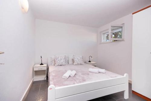 En eller flere senge i et værelse på House Lili