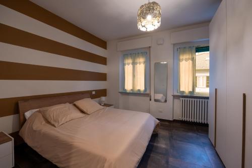 Postel nebo postele na pokoji v ubytování Appartamento San Rocco a Tortona