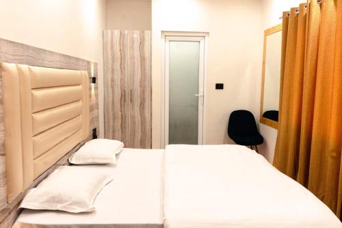 Hotel Asrayaにあるベッド