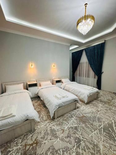 Postel nebo postele na pokoji v ubytování Hotel Soro