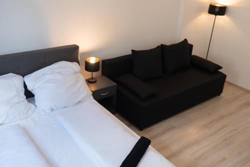 Postel nebo postele na pokoji v ubytování Business Apartment 1 Essen