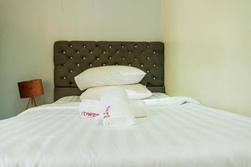 Katil atau katil-katil dalam bilik di Five's Tower